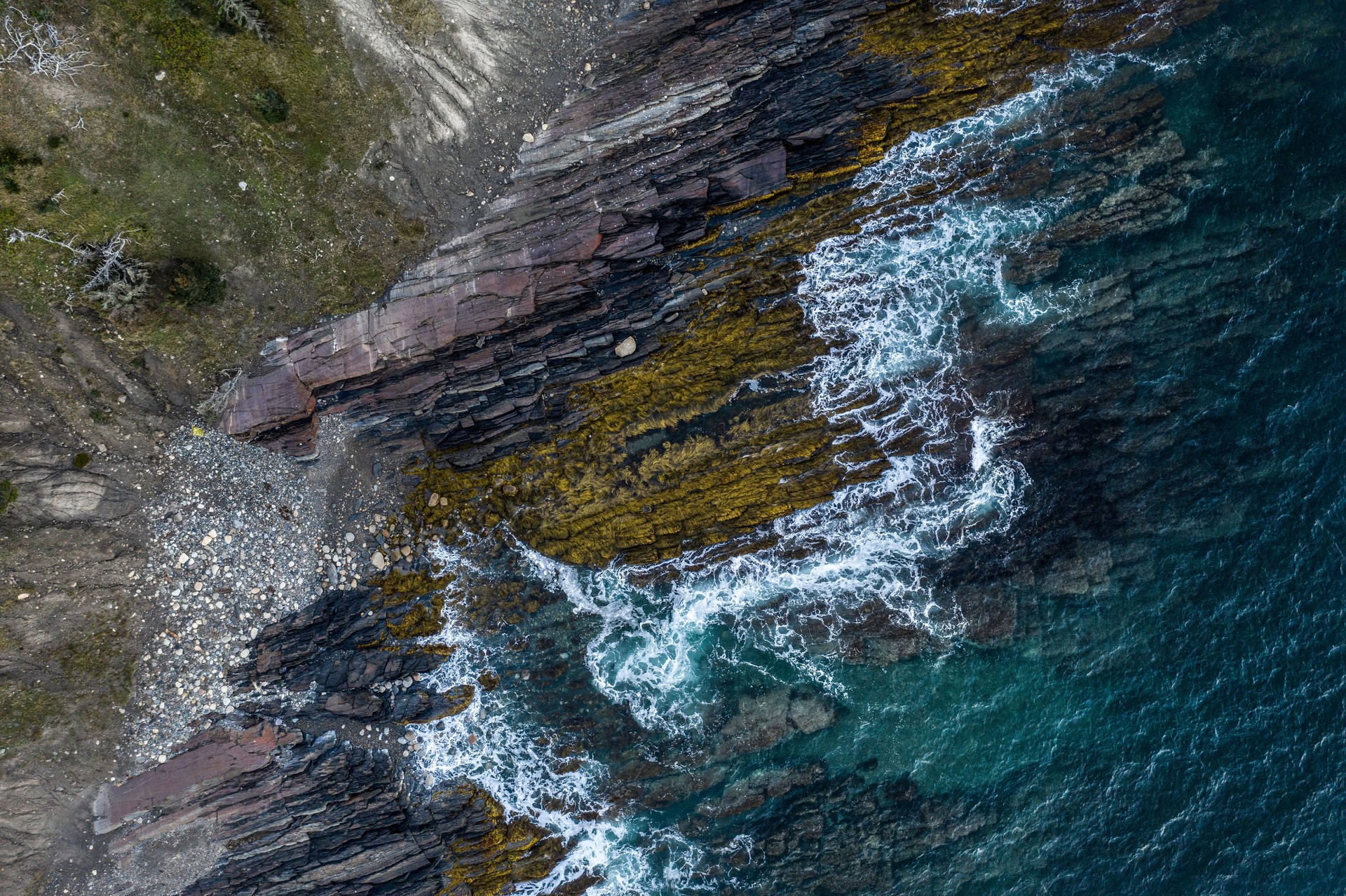 Aerial abstract looking down on colorful canadian shoreline